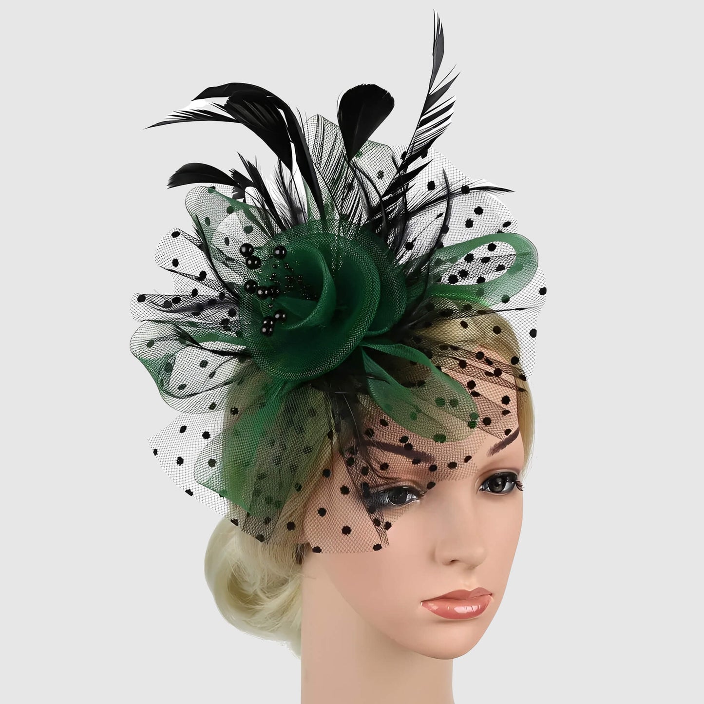 Chapeau de mariage fleur en voile et plumes sur serre-tête