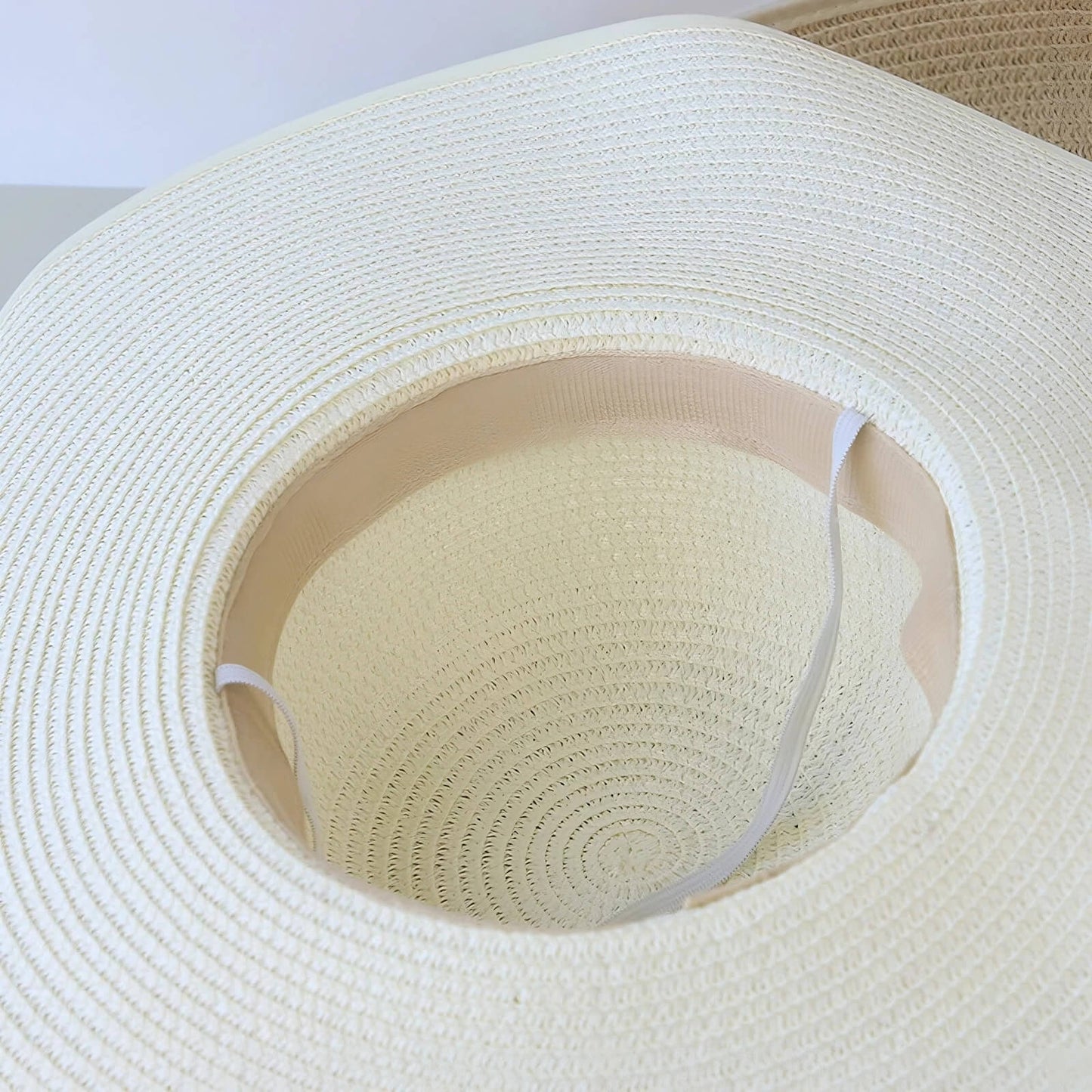 Chapeau de paille pour femme à large bord avec nœud