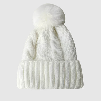 Bonnet en laine femme hiver torsadé pompon fourrure