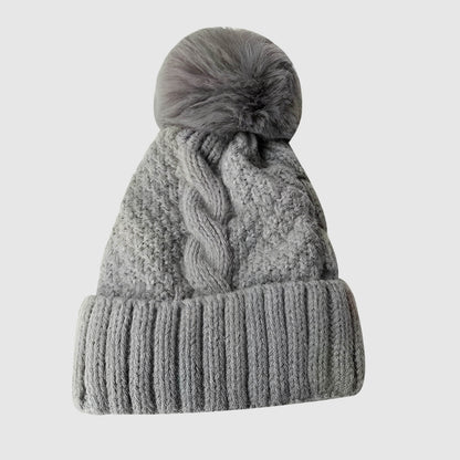 Bonnet en laine femme hiver torsadé pompon fourrure