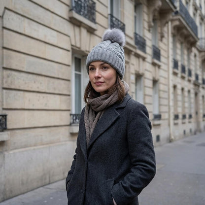 Bonnet en laine femme hiver torsadé pompon fourrure
