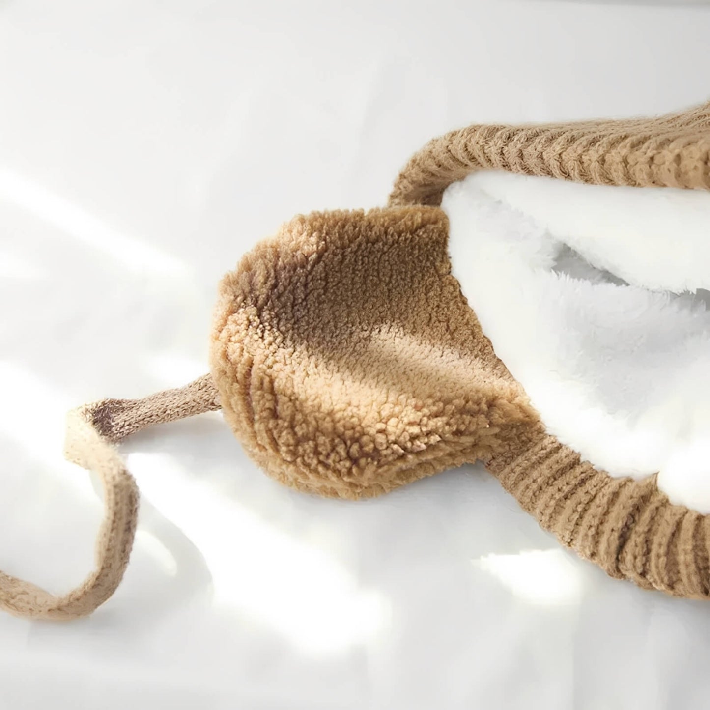 Bonnet enfant pompon – bien chaud avec cache-oreilles