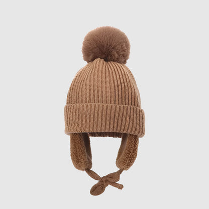 Bonnet enfant pompon – bien chaud avec cache-oreilles