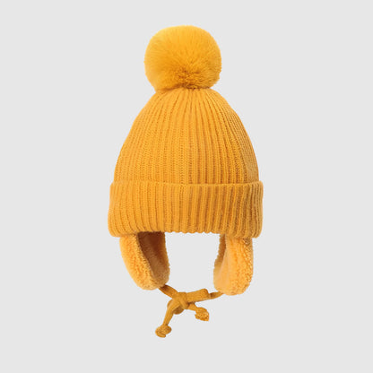 Bonnet enfant pompon – bien chaud avec cache-oreilles