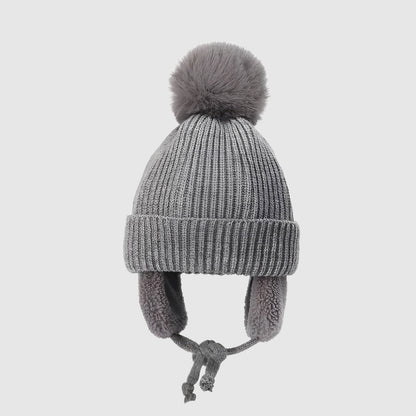 Bonnet enfant pompon – bien chaud avec cache-oreilles