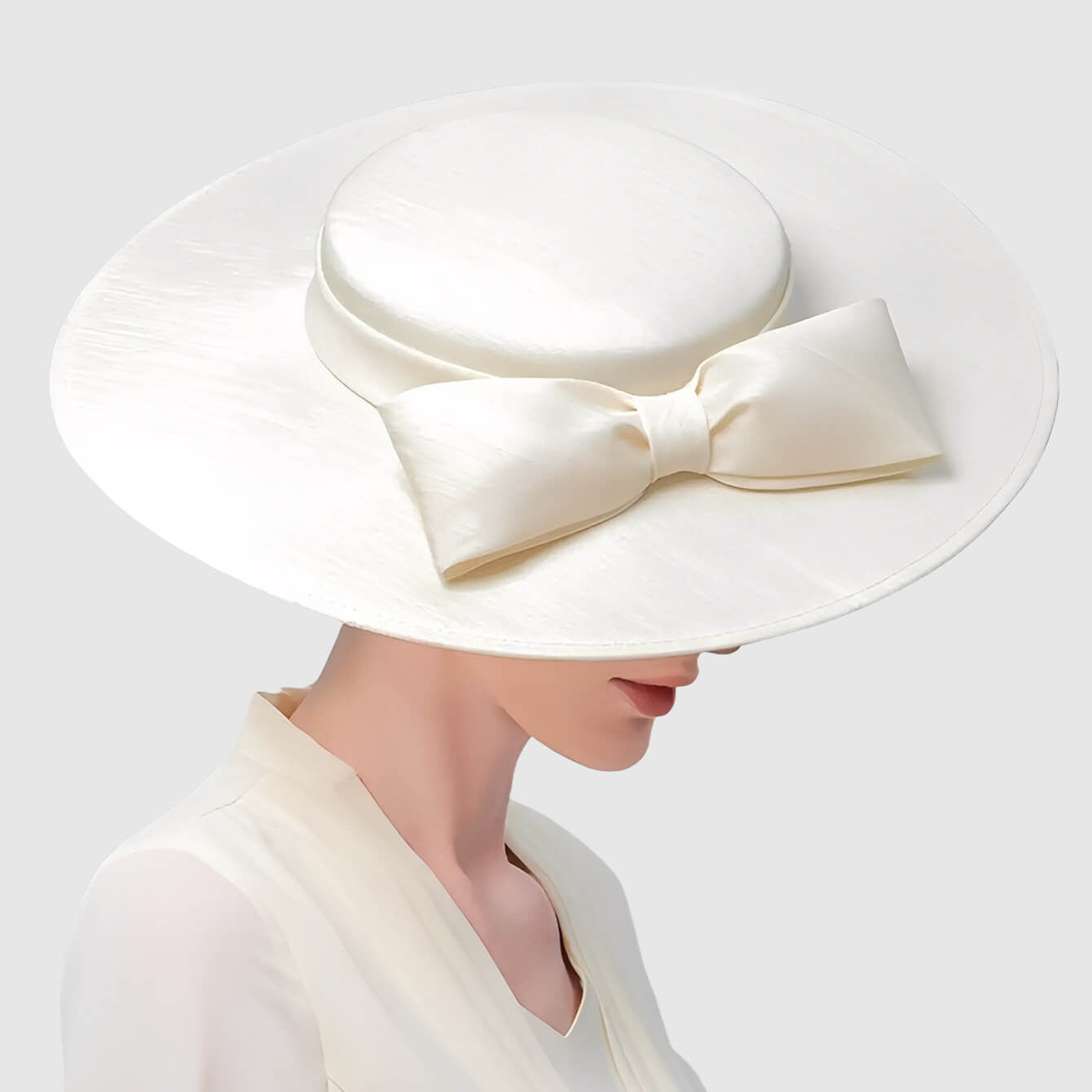 Chapeau de mariage à large bord et grand nœud pour femme