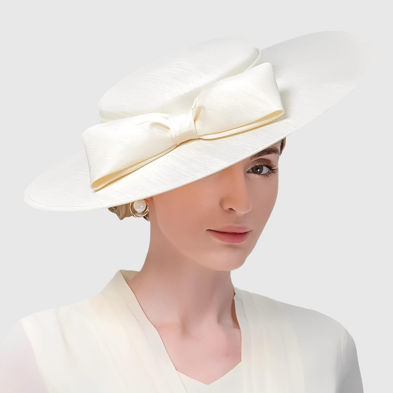 Chapeau de mariage à large bord et grand nœud pour femme