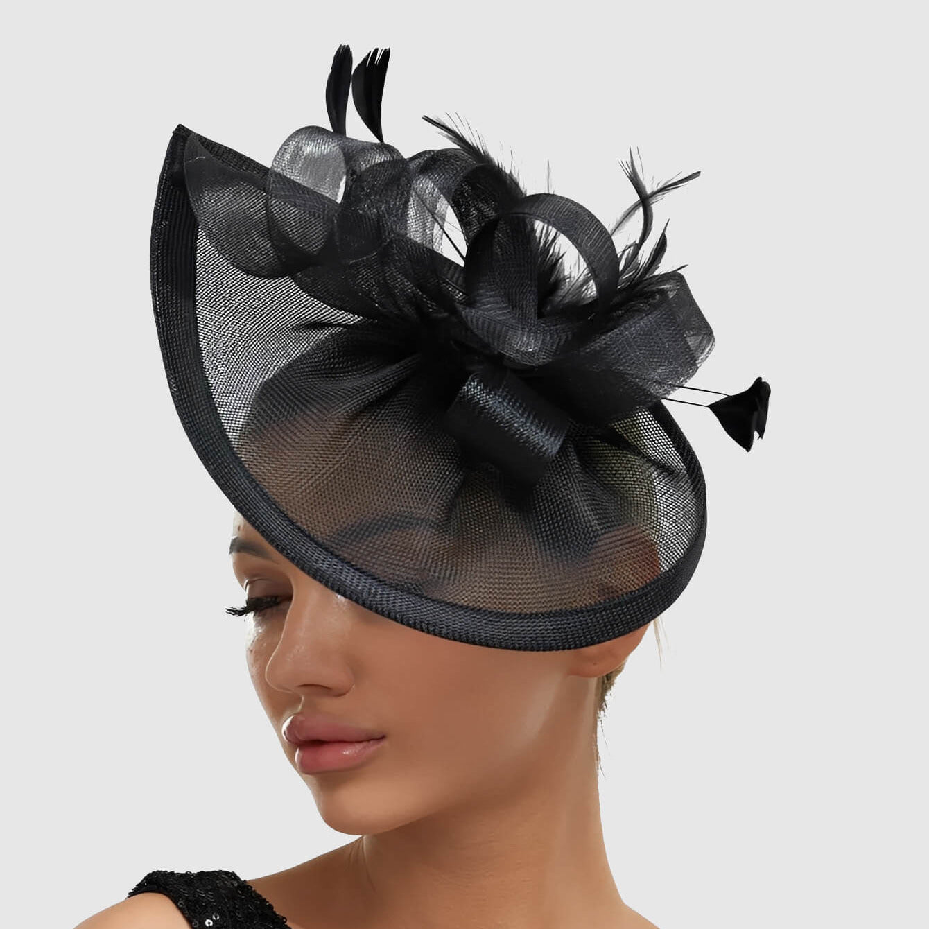 Chapeau de mariage avec plume et fleur