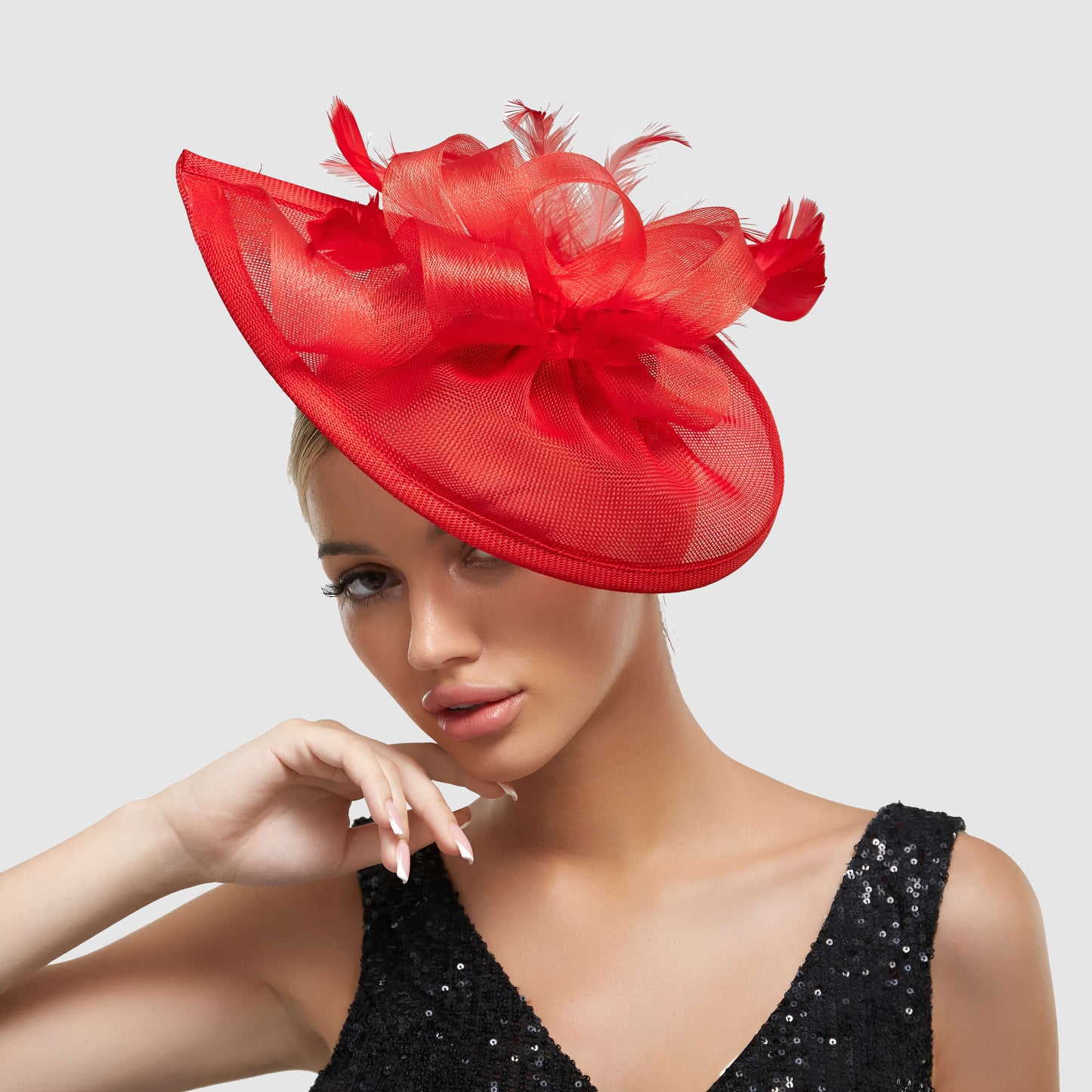 Chapeau de mariage avec plume et fleur