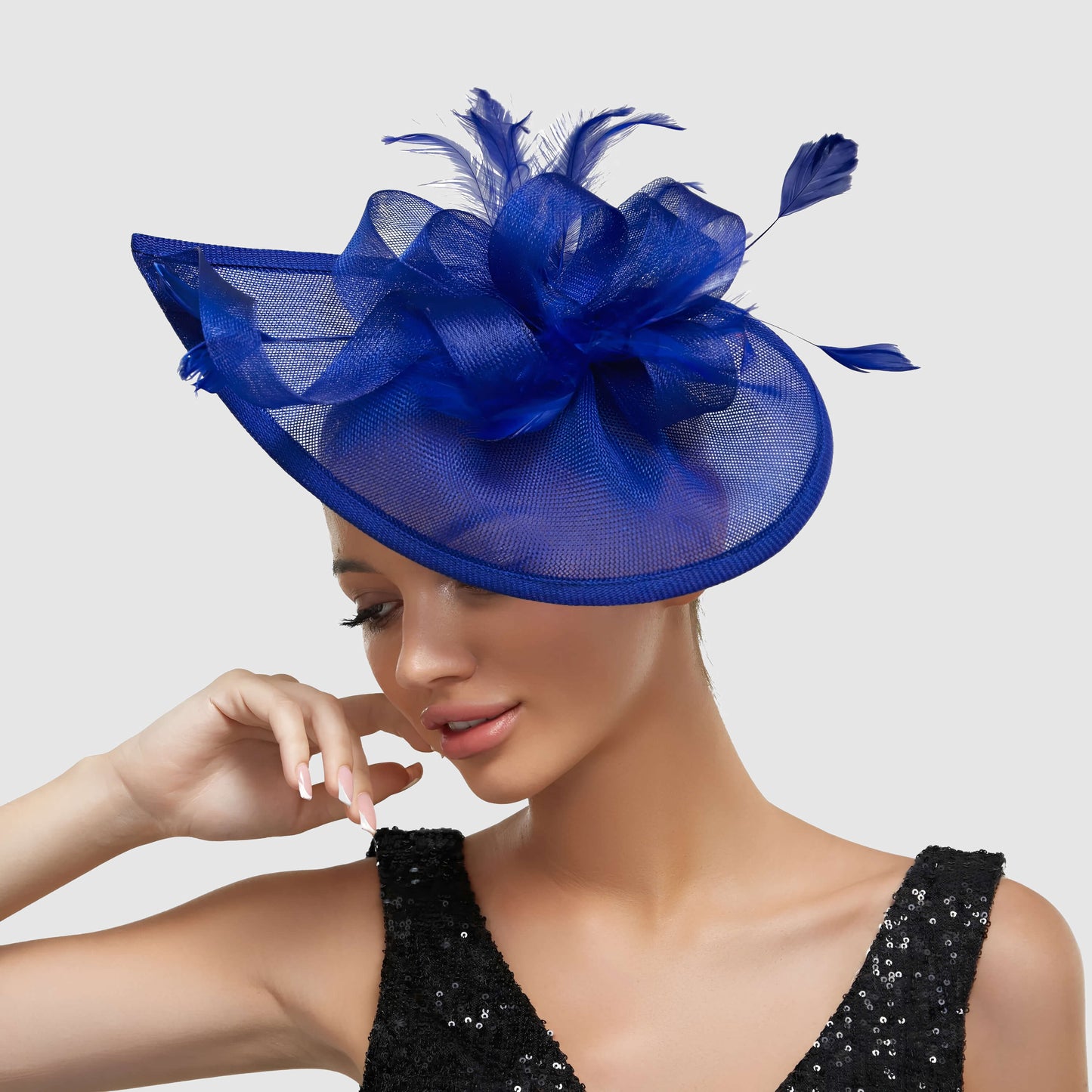 Chapeau de mariage avec plume et fleur