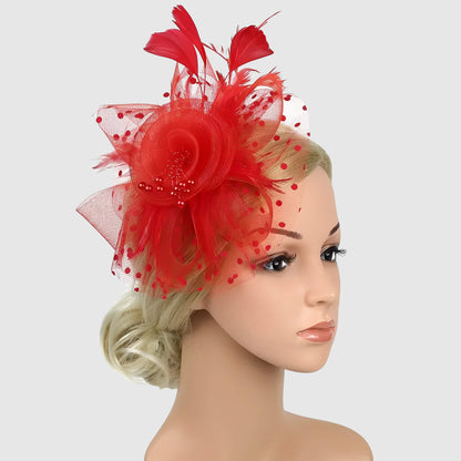 Chapeau de mariage fleur en voile et plumes sur serre-tête