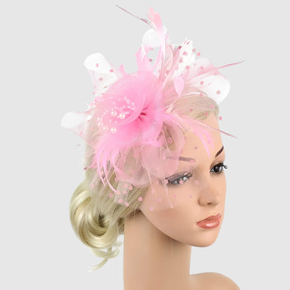 Chapeau de mariage fleur en voile et plumes sur serre-tête