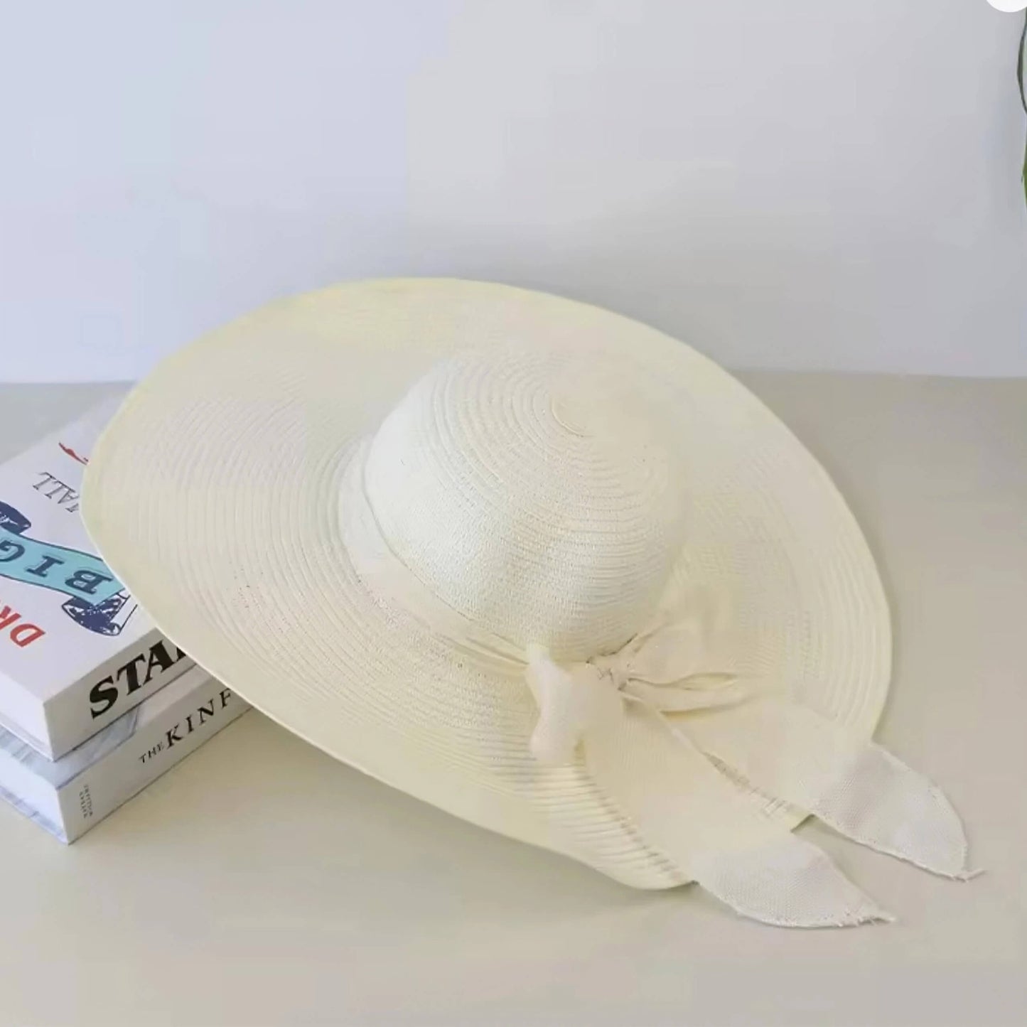 Chapeau de paille pour femme à large bord avec nœud