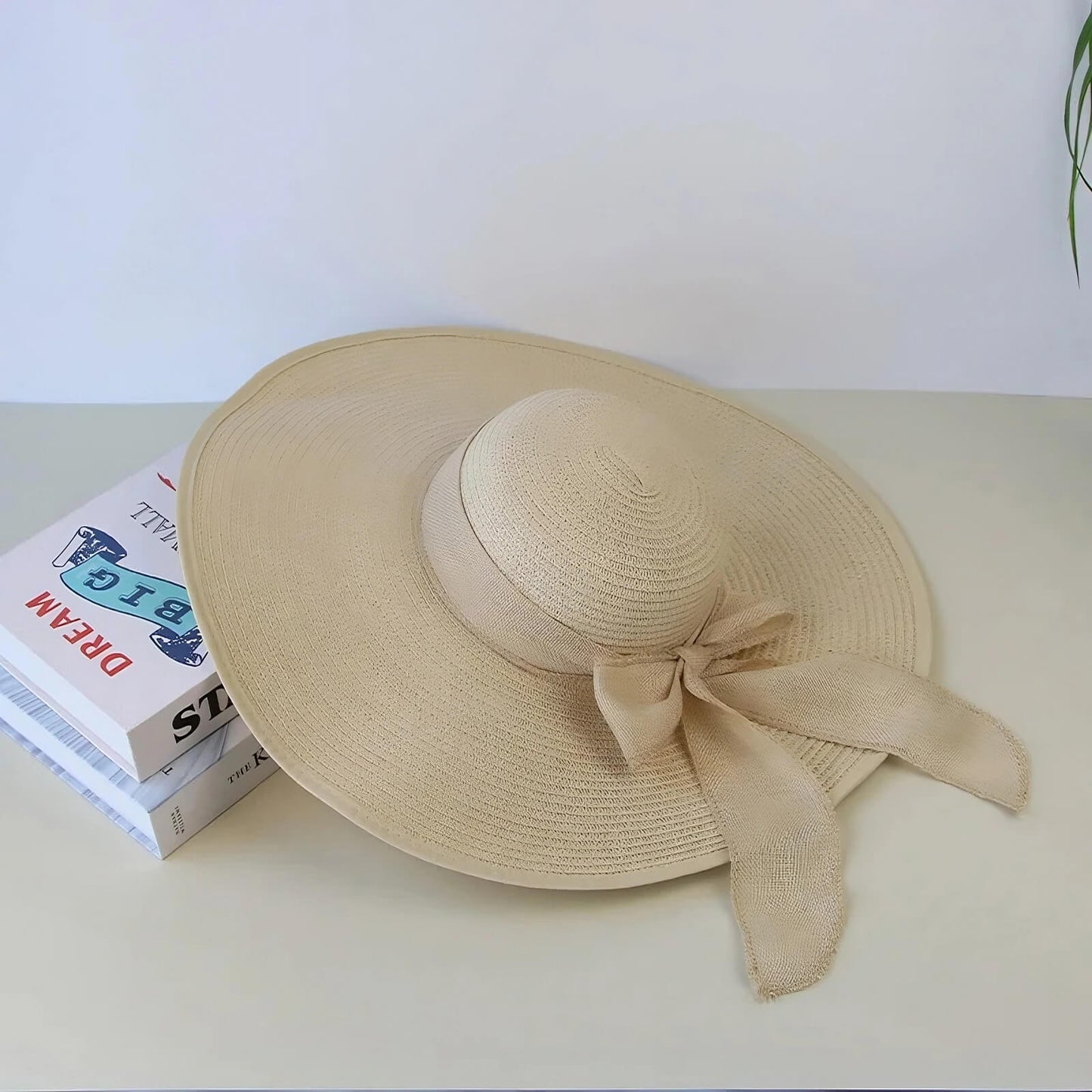 Chapeau de paille pour femme à large bord avec nœud