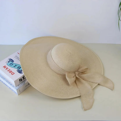 Chapeau de paille pour femme à large bord avec nœud